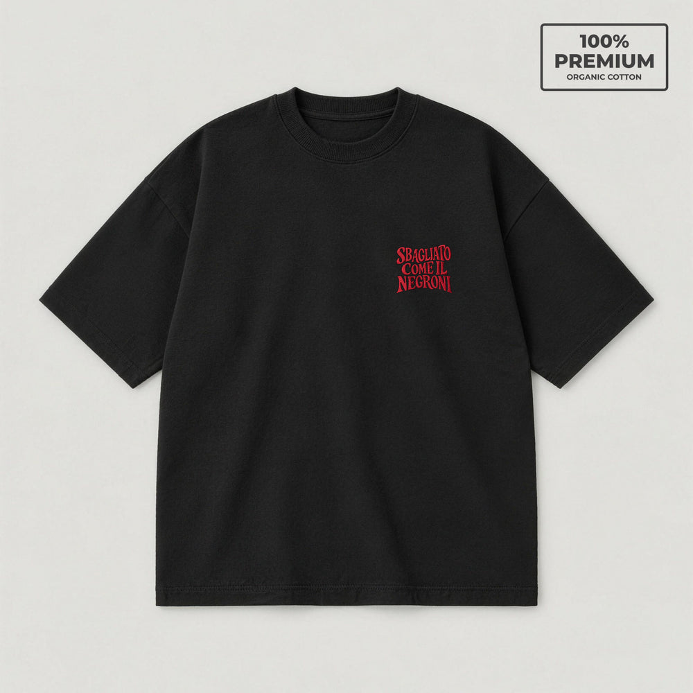 T-shirt oversize nera Sbagliato come il Negroni ricamo rosso lato cuore - fronte