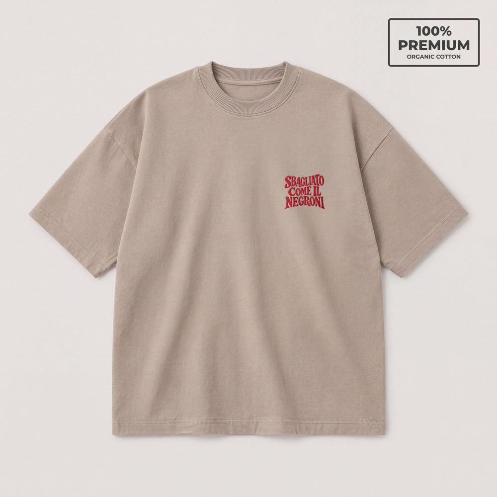 T-shirt oversize beige Sbagliato come il Negroni ricamo rosso lato cuore - fronte