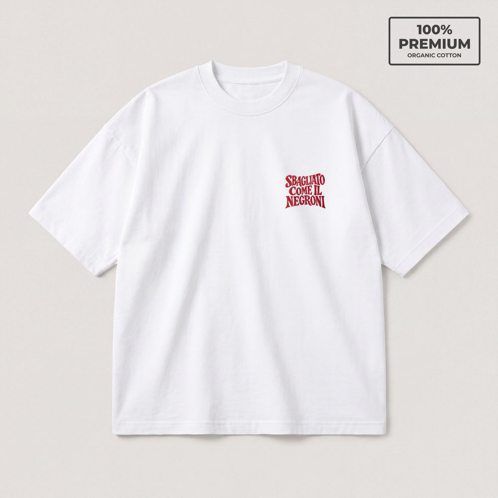 T-shirt oversize bianca Sbagliato come il Negroni ricamo rosso lato cuore - fronte