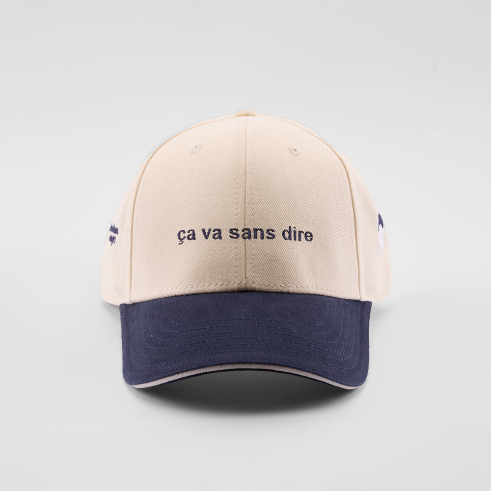 Cappellino bicolore in caldo cotone "ça va sans dire"