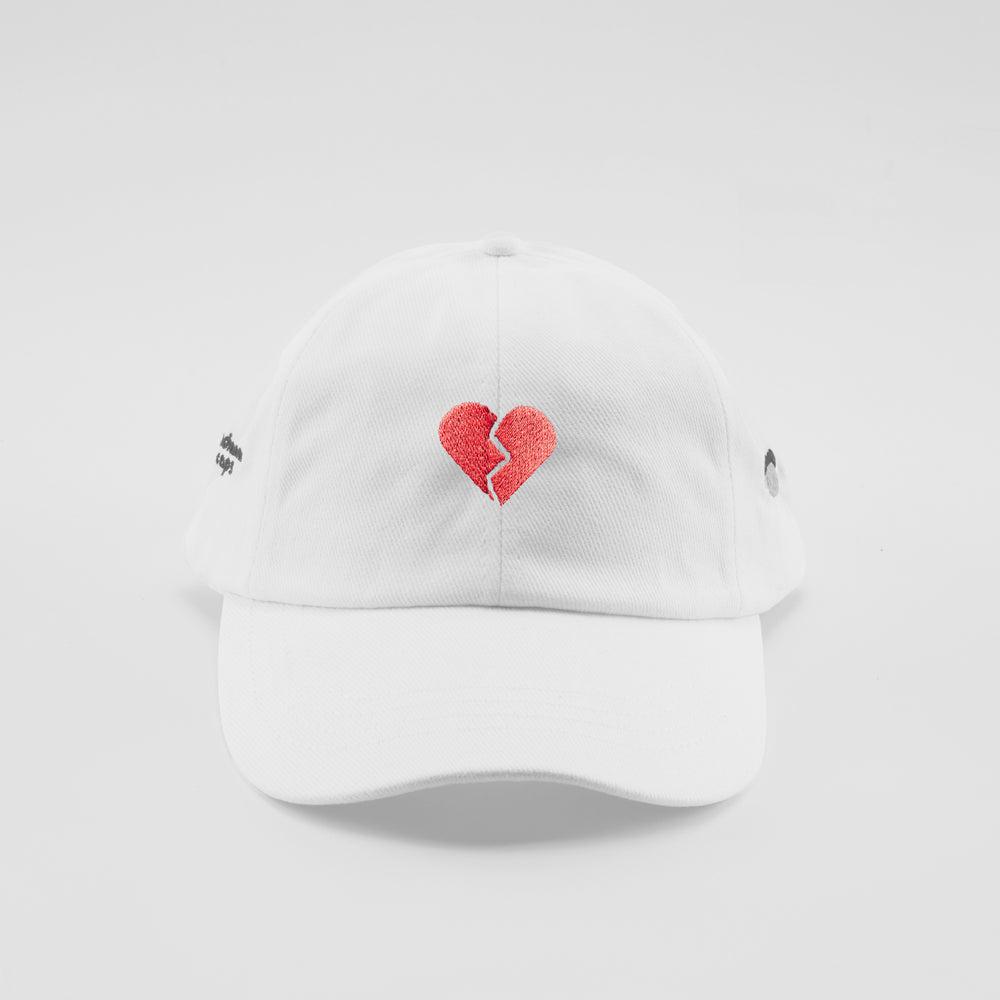 Cappellino in cotone "Cuore spezzato"