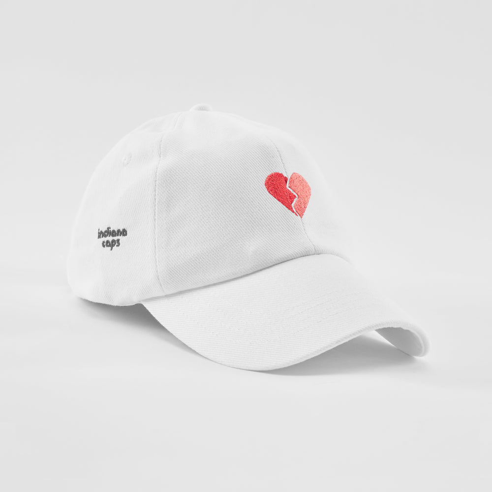 Cappellino in cotone "Cuore spezzato"