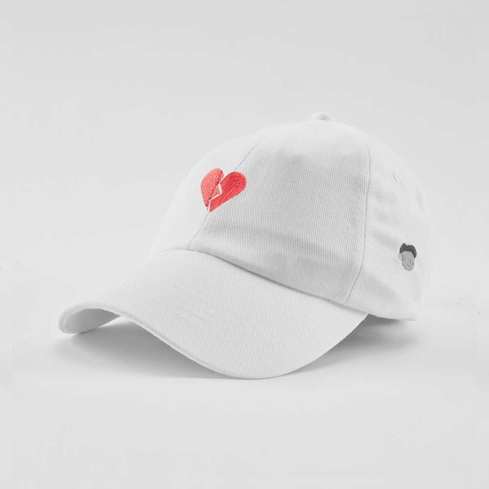 Cappellino in cotone "Cuore spezzato"