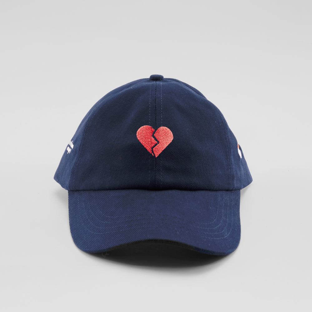 Cappellino in cotone "Cuore spezzato"