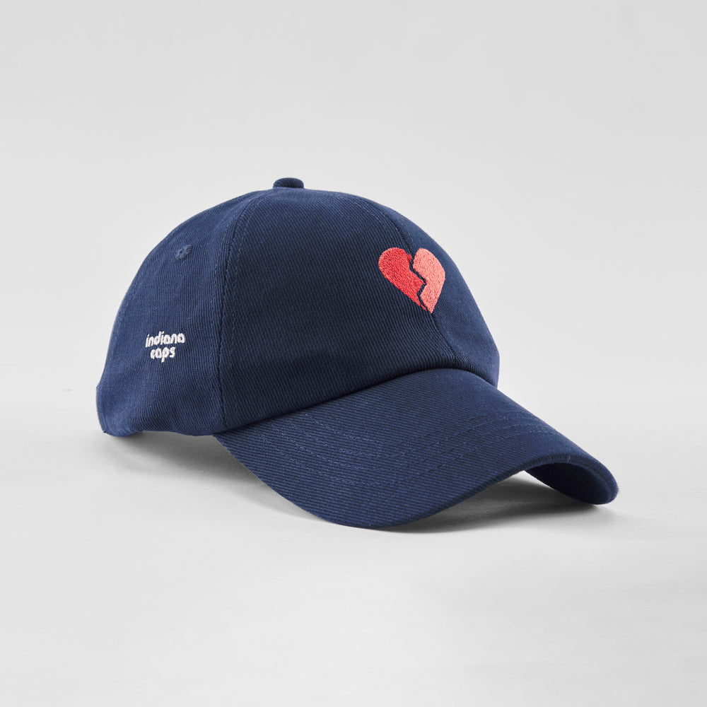 Cappellino in cotone "Cuore spezzato"