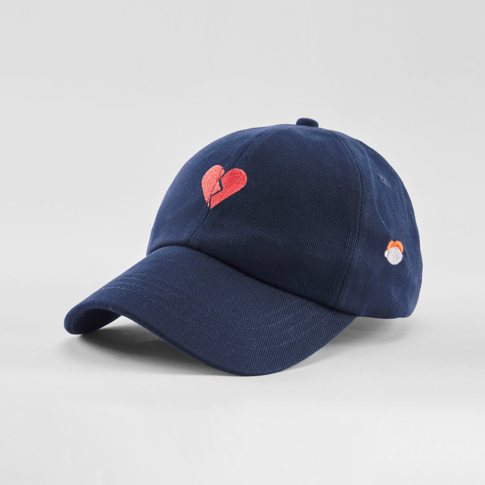 Cappellino in cotone "Cuore spezzato"