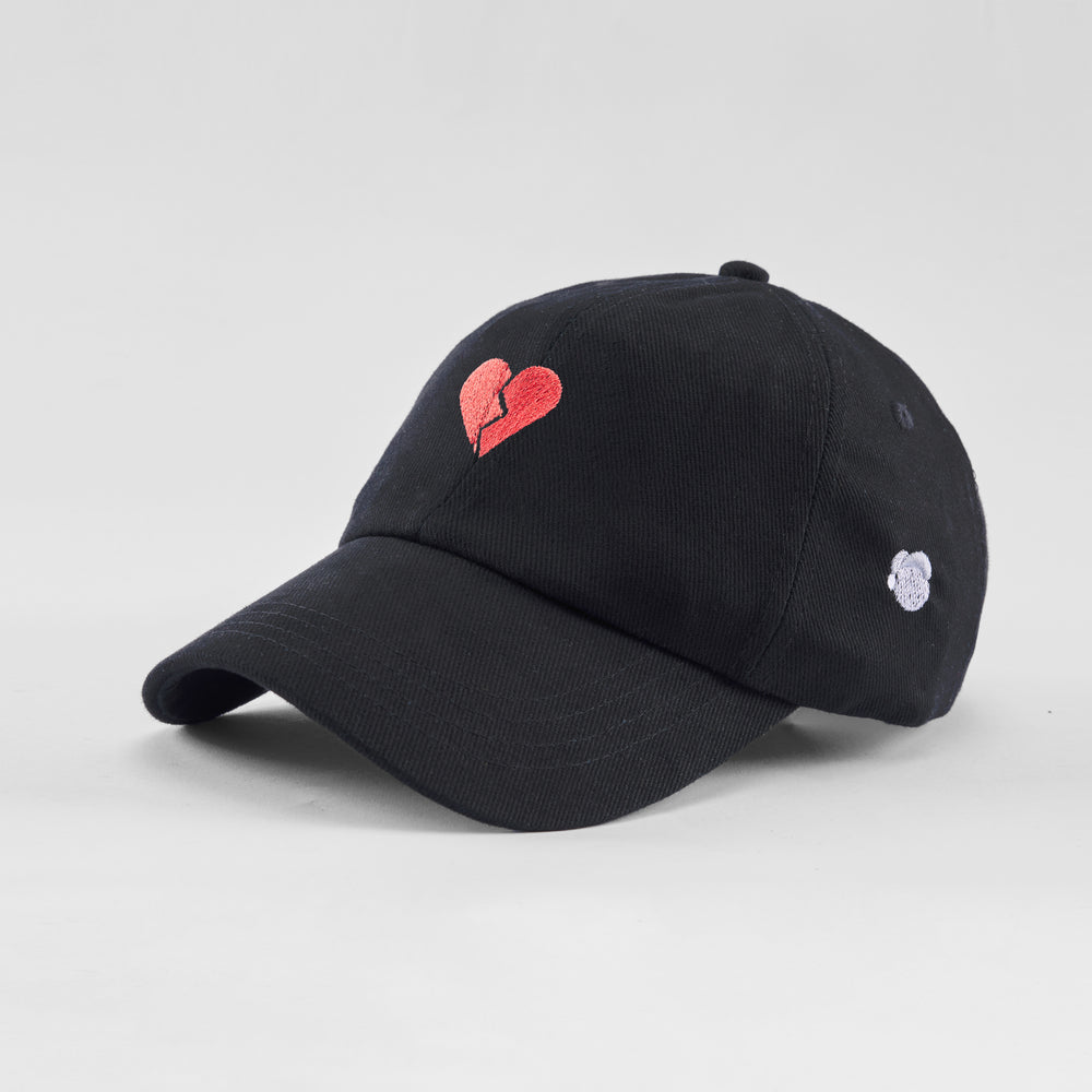 Cappellino in cotone "Cuore spezzato"