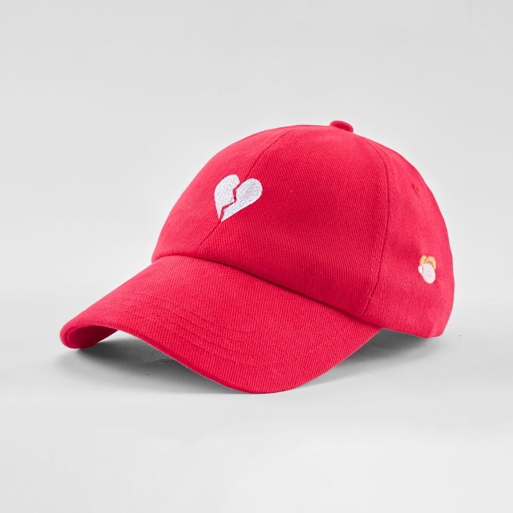 Cappellino in cotone "Cuore spezzato"