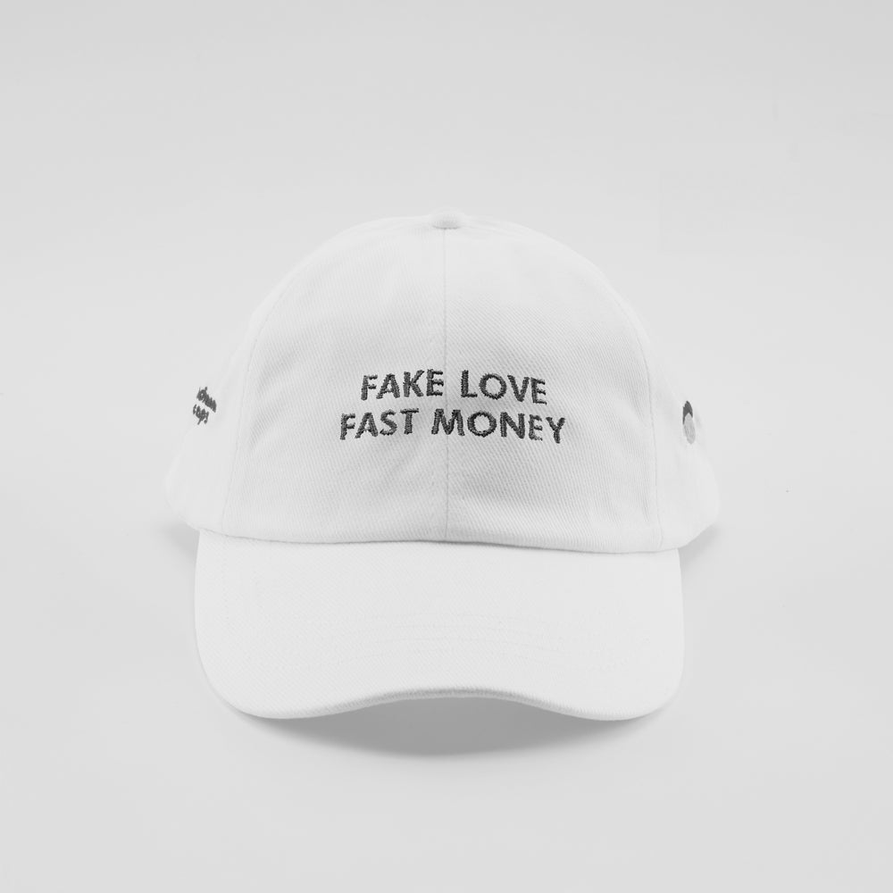 Cappellino in cotone "Fake love, fast Money"